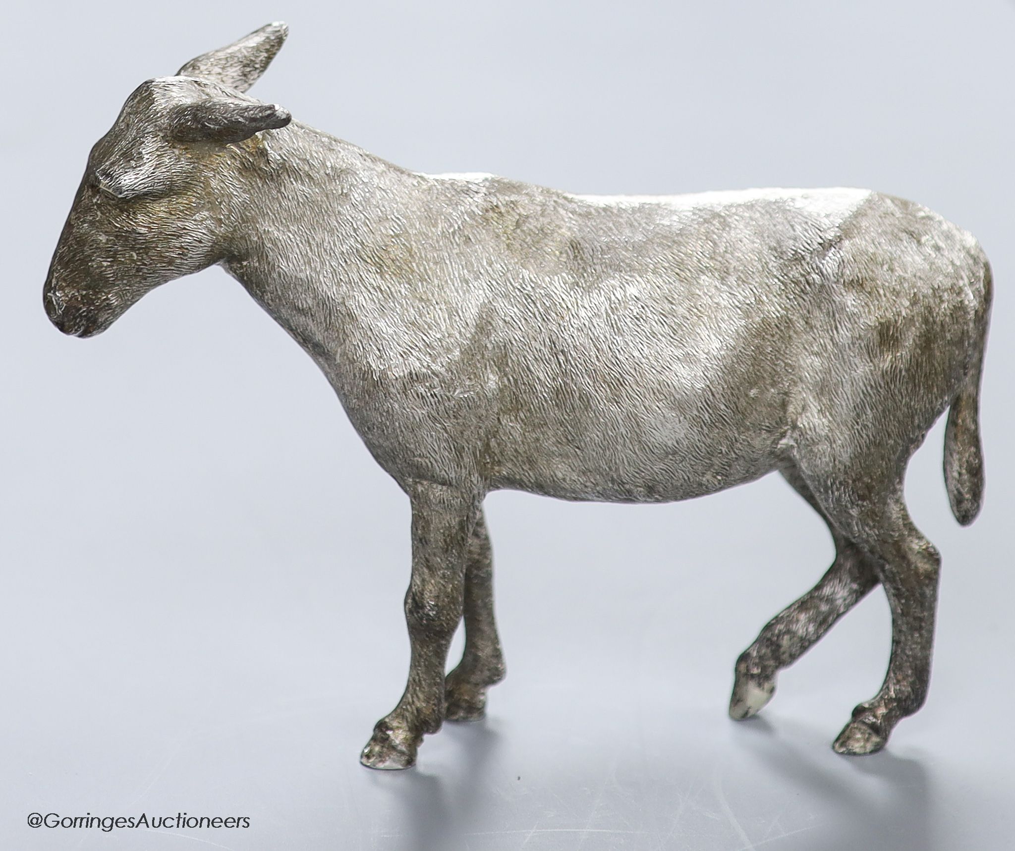 A 1960s' free standing silver miniature model of a donkey, Edward Barnard & Sons, London, 1964, height 12.5cm, 20.5oz.